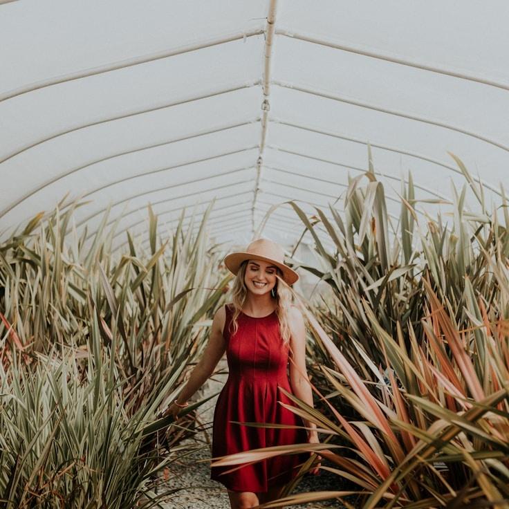 Kaveri Mehta, Lead Design Curator at Even Field Logic, reviewing corporate floral arrangements